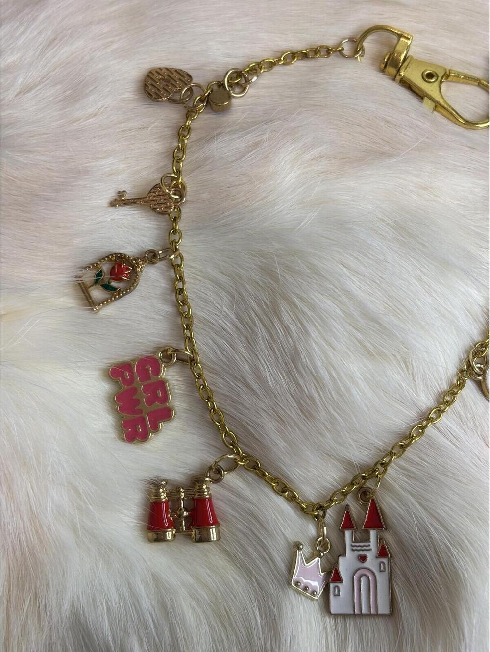 Gold Tone bag Charm with Book, Castle, and Girl Power Charms - Picture 3 of 3